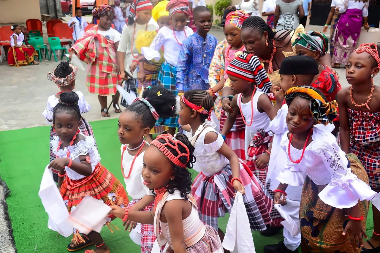 Pupils in traditional dress lined up for the Cultural Day parade